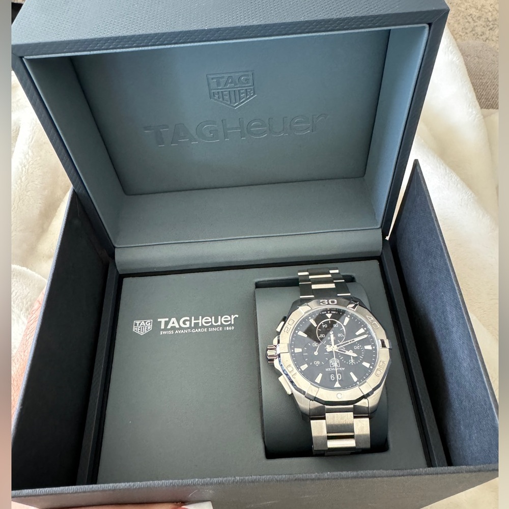 Quartz chronograph mens watch, new never worn, in box with warranty card.